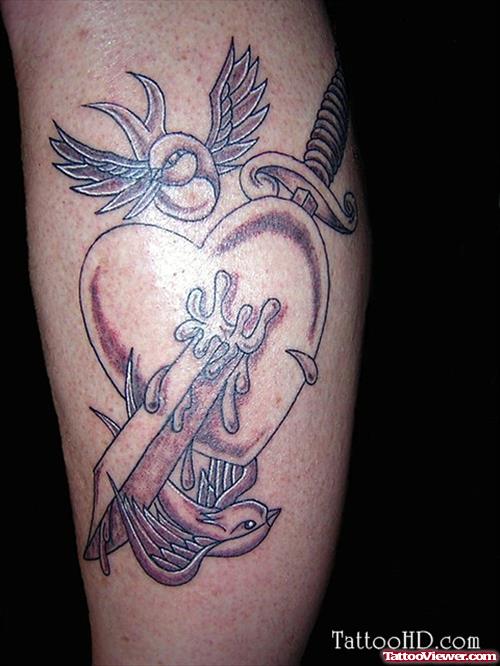 Flying Birds And Dagger Heart Leg Tattoo