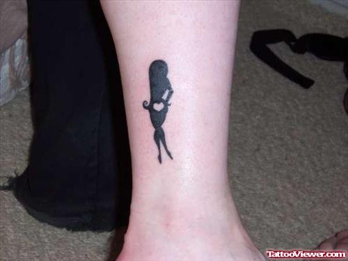 Black Ink Lady Leg Tattoo