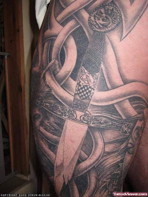 Knots And Dagger Leg Tattoo