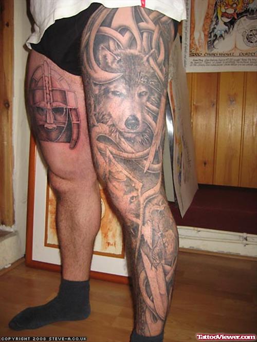 Tribal And Wolf Head Leg Tattoo