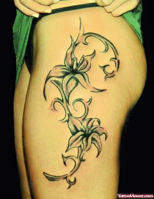 Tribal And Flower Side Leg Tattoo