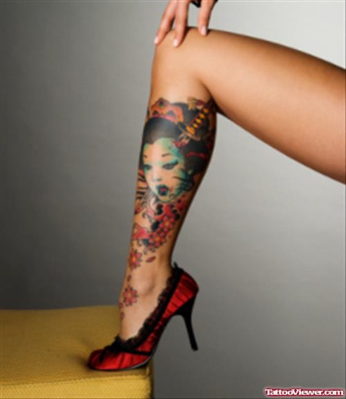 Red Flowers And Girl Head Leg Tattoo
