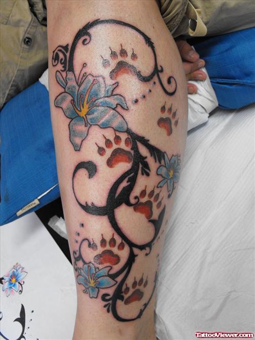 Red Ink Paw Prints And Blue Flowers Leg Tattoo