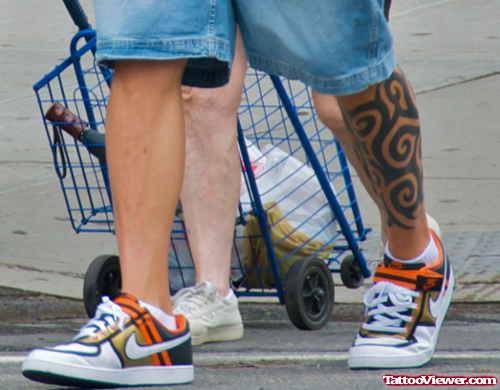 Black Ink Tribal Left Leg Tattoo
