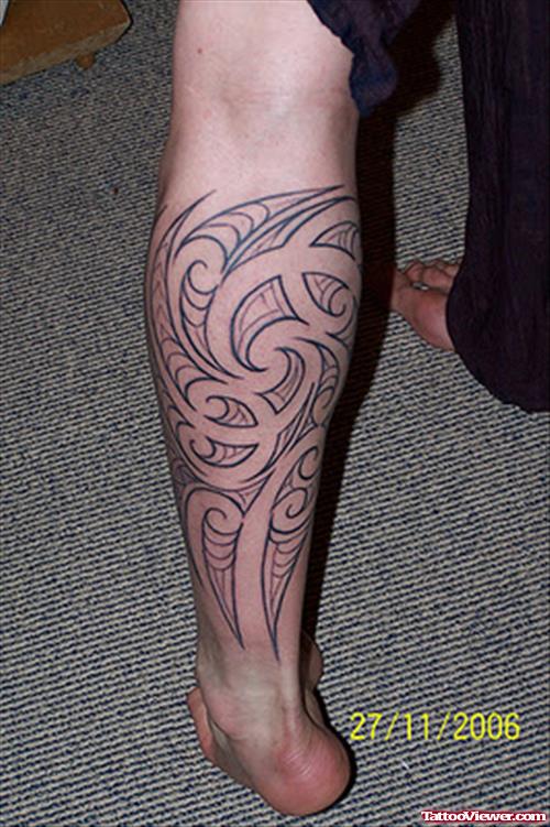 Maori Tribal Back Leg Tattoo