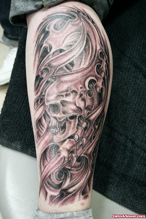 Grey Ink Skull And Biomechanical Leg Tattoo