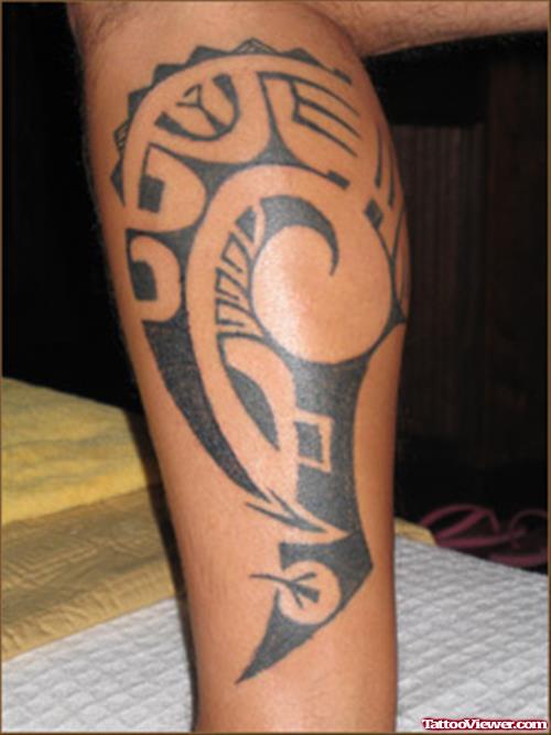 Cool Black Ink Tribal Leg Tattoo
