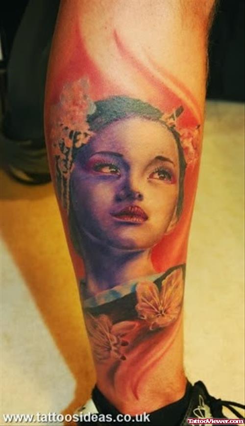 Awesome Flowers And Girl Head Leg Tattoo