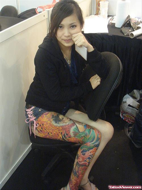 Beautiful Girl With Colored Right Sleeve Leg Tattoo