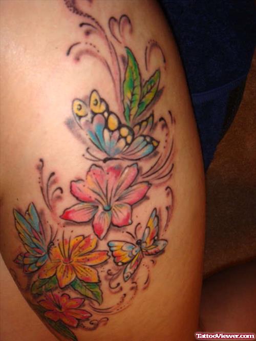 Colored Flowers And Butterfly Leg Tattoo