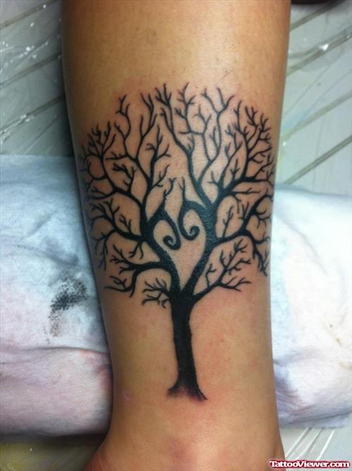 Black Tree Leg Tattoo