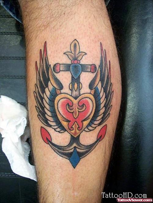 Colored Winged Anchor Leg Tattoo