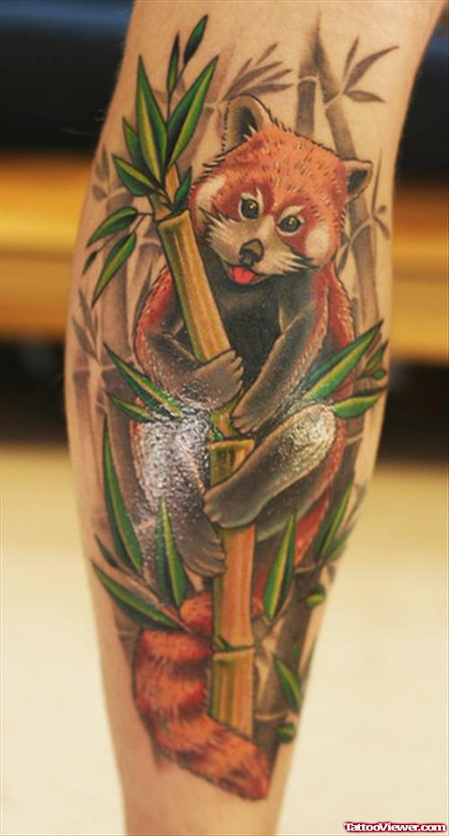 Colored Ink Bear In Bamboo Tree Back Leg Tattoo