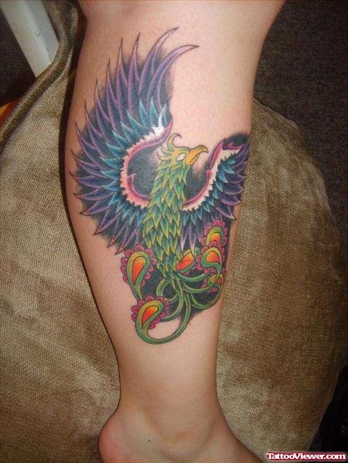 Colored Flying Phoenix Leg Tattoo
