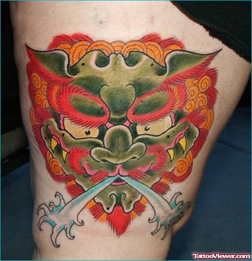 Colored Ink Leg Tattoo