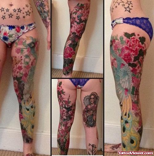 Colored Flowers And Peacock Leg Tattoo