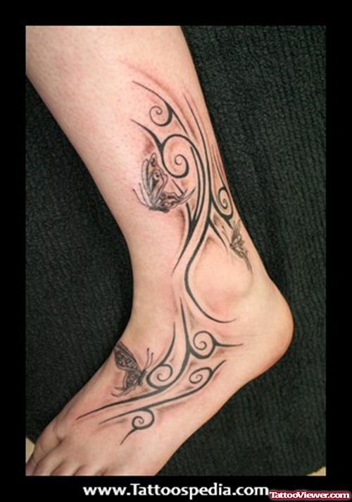 Butterfly And Tribal Leg Tattoo