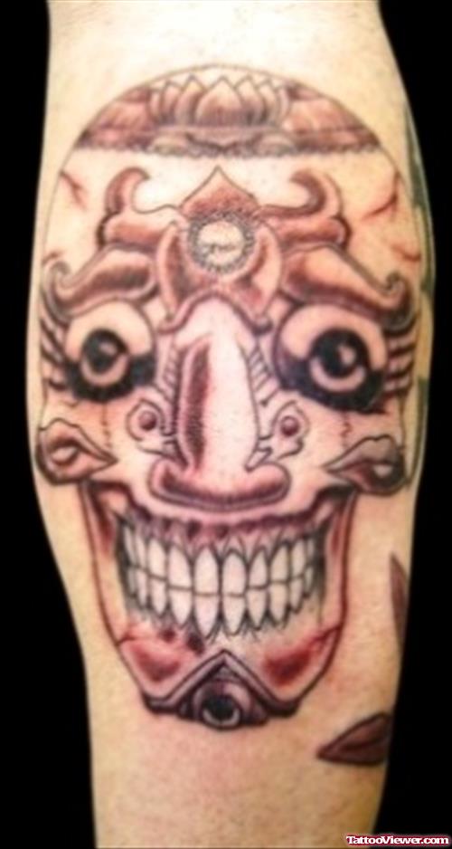 Grey Ink Skull Leg Tattoo