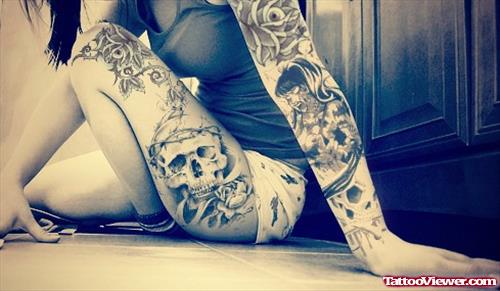 Flower And Skull And Leg Tattoo