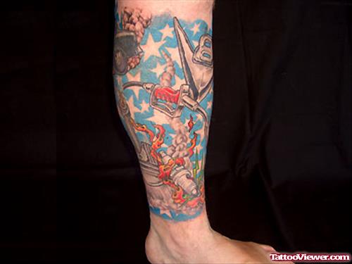 Flaming Piston And Petrol Tattoo On Leg