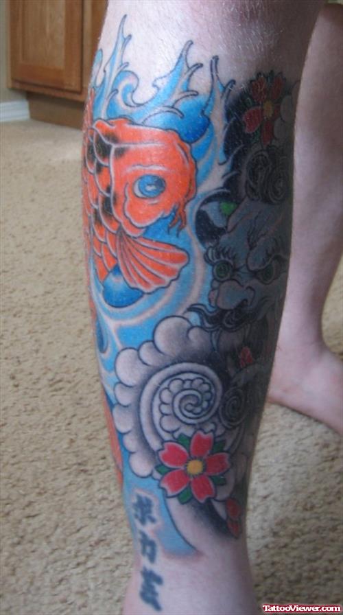 Colored Fish And Flower Leg Tattoo