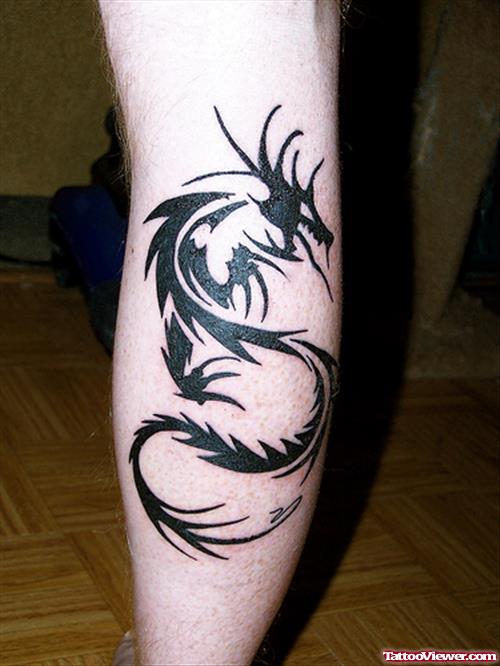 Black Tribal dragon Leg Tattoo