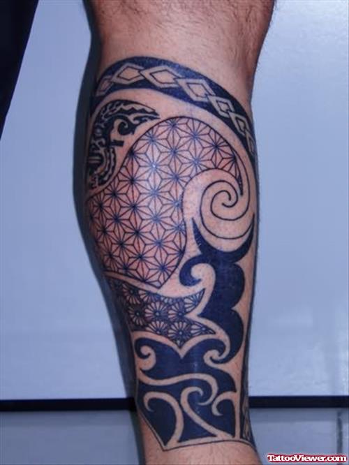 Awesome Black Ink Maori Leg Tattoo