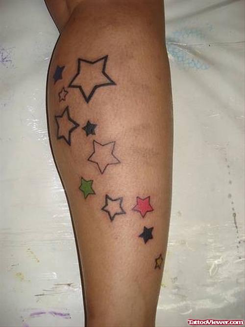 Coloured Stars Tattoos On Leg