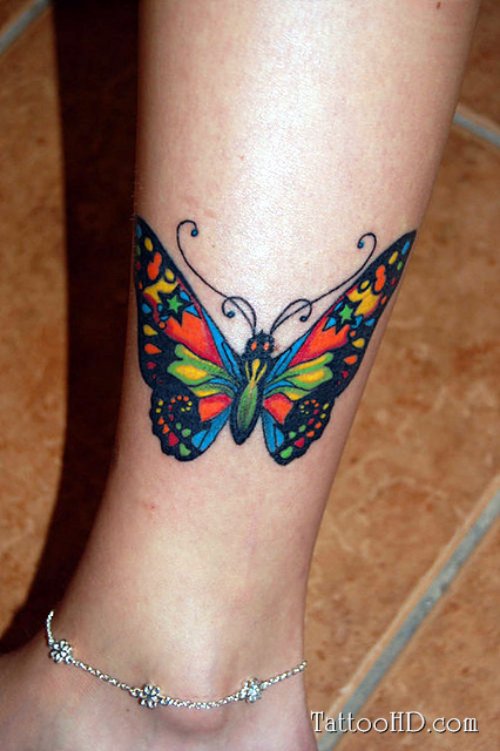 Awesome Colored Butterfly Leg Tattoo