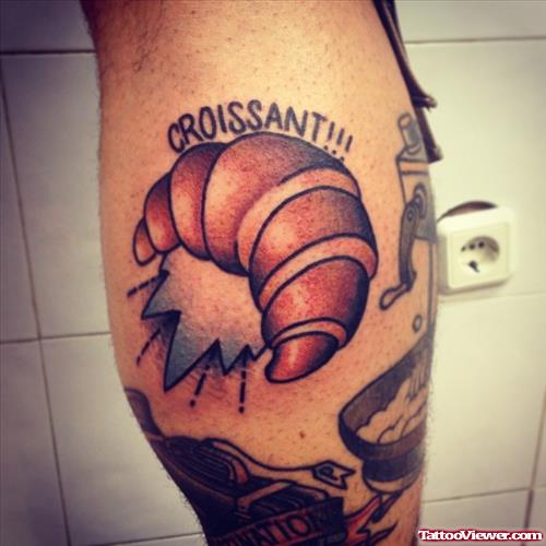 croissant tattoo on leg