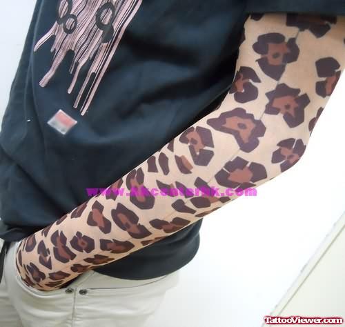 Leopard Spots Print Tattoo On Arm