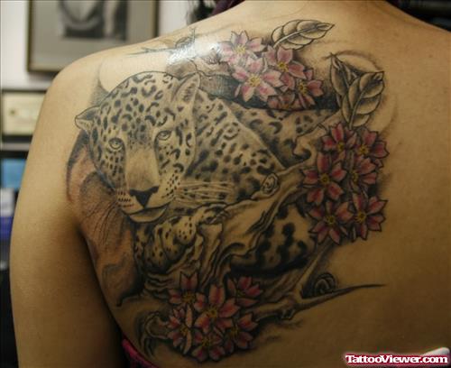 Leopard In Flowers Tattoo On Back