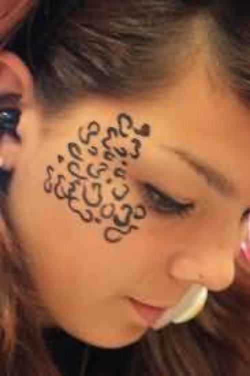 Leopard Print Tattoo For Girl