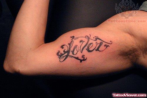 Lettering Tattoo On Muscles