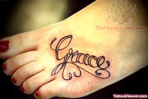 Grace Lettering Tattoo On Foot