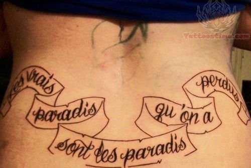 Lower Back Lettering Tattoo