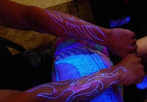 Outline Tribal Light Tattoo On Right Sleeve