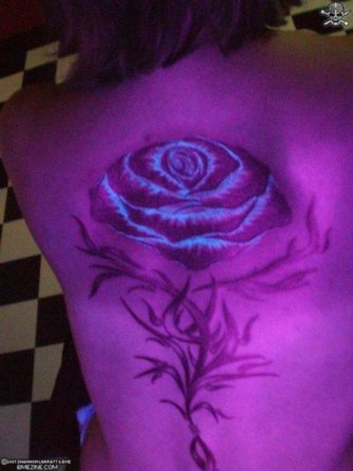 Uv Light Rose Tattoo On Back