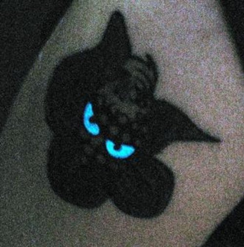 Blue Eyes Black Light Tattoo