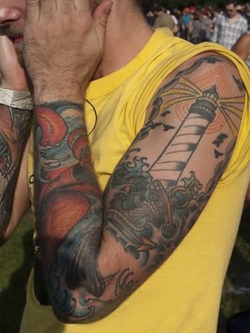 Man Left Sleeve Lighthouse Tattoo