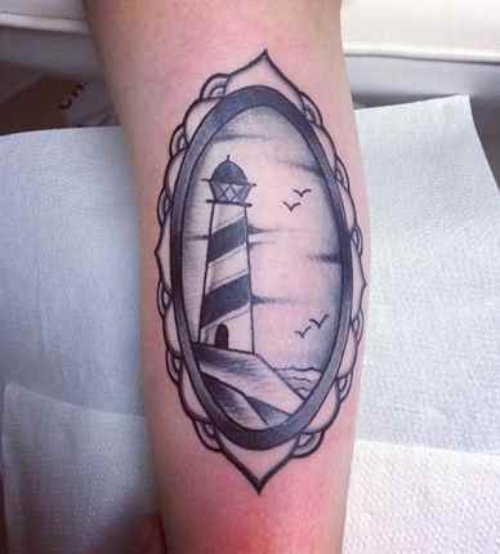 Mirror And Lighthouse Tattoo On Leg