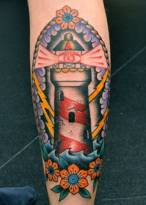 Yellow Flowers And Lighthouse Tattoo On Leg