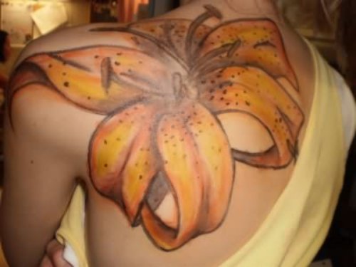 Yellow Flower Tattoo On Back