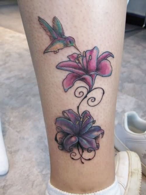 Flying Hummingbird and Lily Flowers Tattoo
