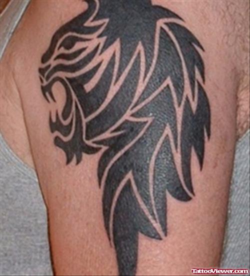 Black Ink Tribal Lion Head Tattoo On Half Sleeve