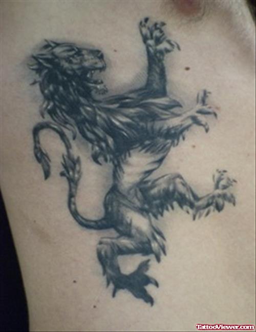 Grey Ink Lion Tattoo On Side Rib