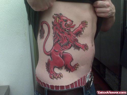 Red Ink Lion Tattoo On Side Rib