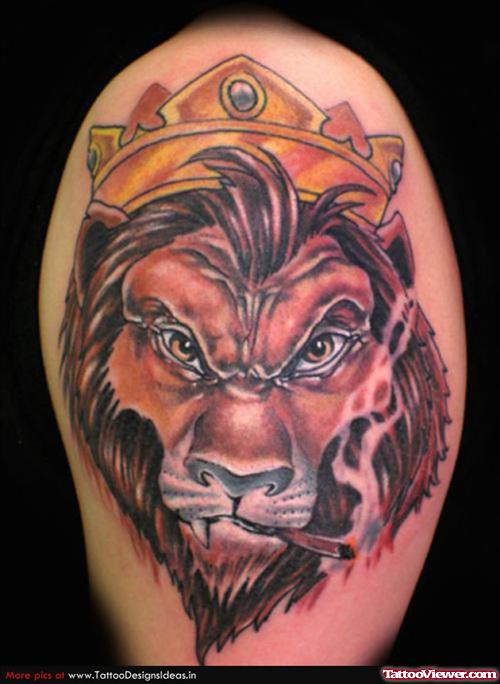 Colored Lion Head With Crown Tattoo On Shoulder