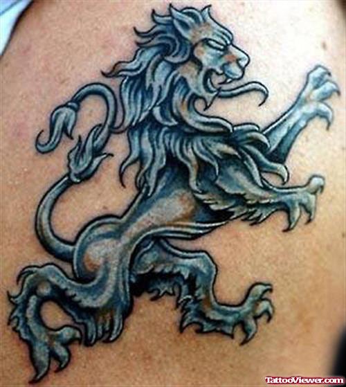 Blue Onk Lion Tattoo On Shoulder
