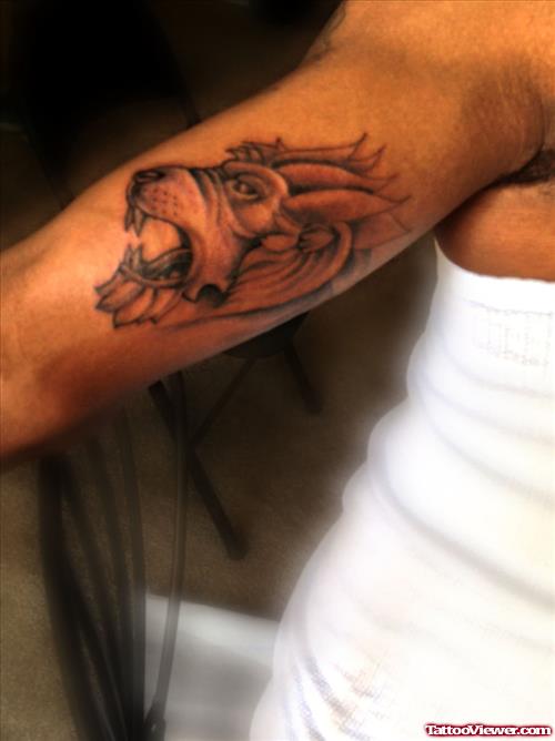 Bicep Lion Head Tattoo